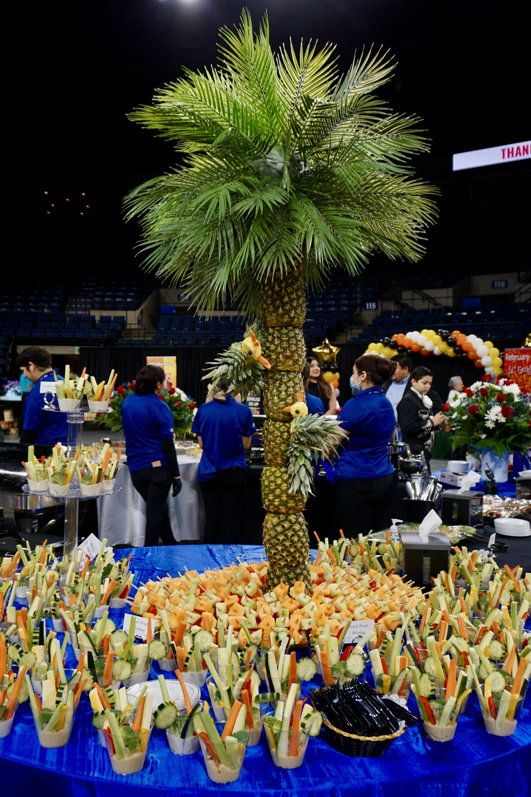 Elegant catered event setup with plated gourmet dishes by Savor Catering